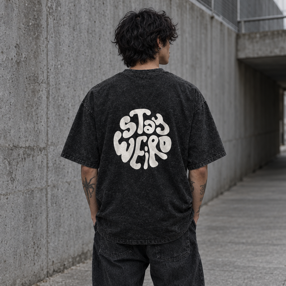 Stay Weird Spicy Brains oversized tee – man showing the circular Stay Weird back print, AI-generated mockup