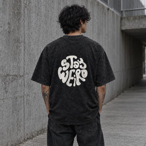 Stay Weird Spicy Brains oversized tee – man showing the circular Stay Weird back print, AI-generated mockup