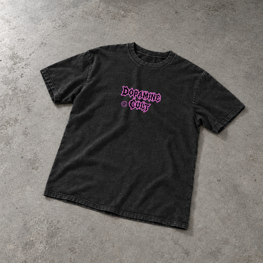 Dopamine Cult snow-washed oversized tee – washed black oversized tee with pink Dopamine Cult chest print, flat lay, AI-generated mockup