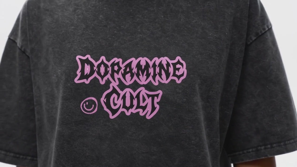 Dopamine Cult snow-washed oversized tee – close-up of the pink gothic Dopamine Cult print, AI-generated mockup