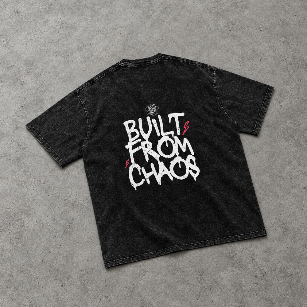 Built From Chaos oversized tee – back of the tee with Built From Chaos graffiti and red lightning, flat lay, AI-generated mockup