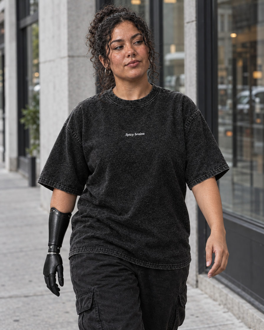 Stay Weird Spicy Brains oversized tee – woman wearing the tee, front view, AI-generated mockup