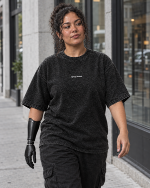 Stay Weird Spicy Brains oversized tee – woman wearing the tee, front view, AI-generated mockup