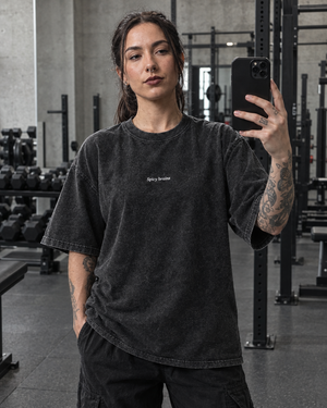 Stay Weird Spicy Brains oversized tee – woman wearing the tee, mirror selfie, AI-generated mockup
