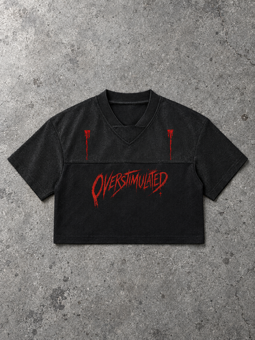Overstimulated cropped V-neck jersey – black cropped jersey with red dripping Overstimulated print, flat lay, AI-generated mockup