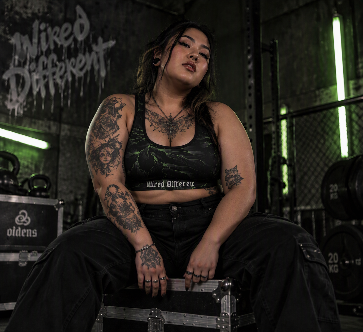 Wired Different sports bra – woman wearing the sports bra in a gym, seated, AI-generated mockup