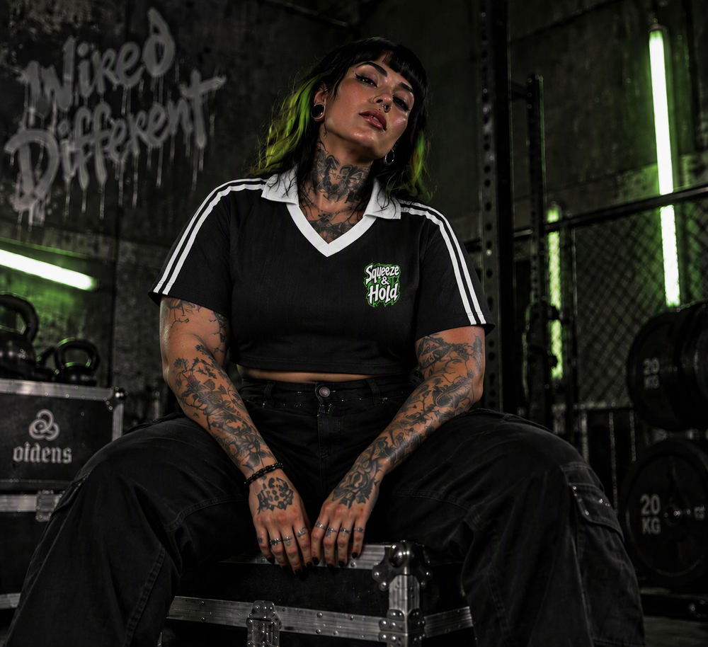 Squeeze & Hold cropped jersey – woman wearing the jersey in a gym, front view, AI-generated mockup