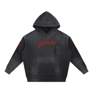 Overstimulated distressed horror hoodie – distressed washed black hoodie, front, flat lay, AI-generated mockup