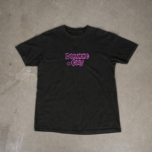 Dopamine Cult snow-washed oversized tee – front of the washed black tee on concrete, AI-generated mockup