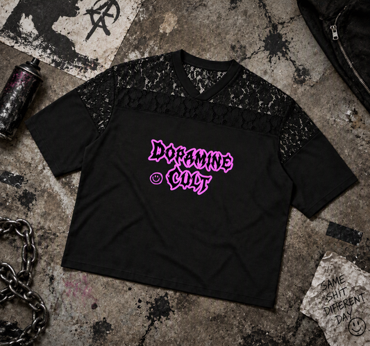 Dopamine Cult lace football jersey – black jersey with lace shoulders and pink Dopamine Cult print, flat lay, AI-generated mockup